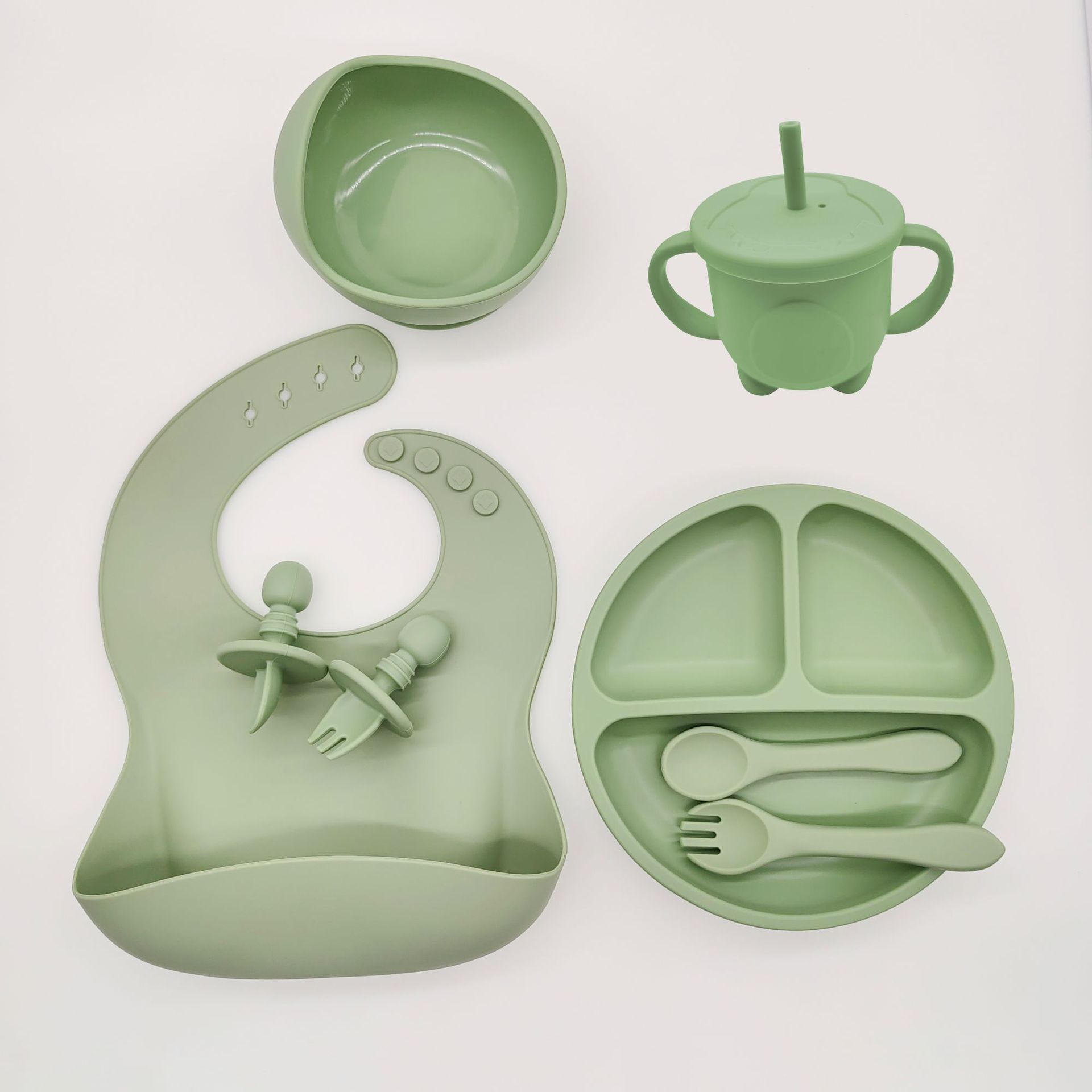2022 Hot Selling 9 Piece Silicone Tableware Set with Plate Crater Cup Cochlear Fork Crater Bib for Toddler infants and Kids
